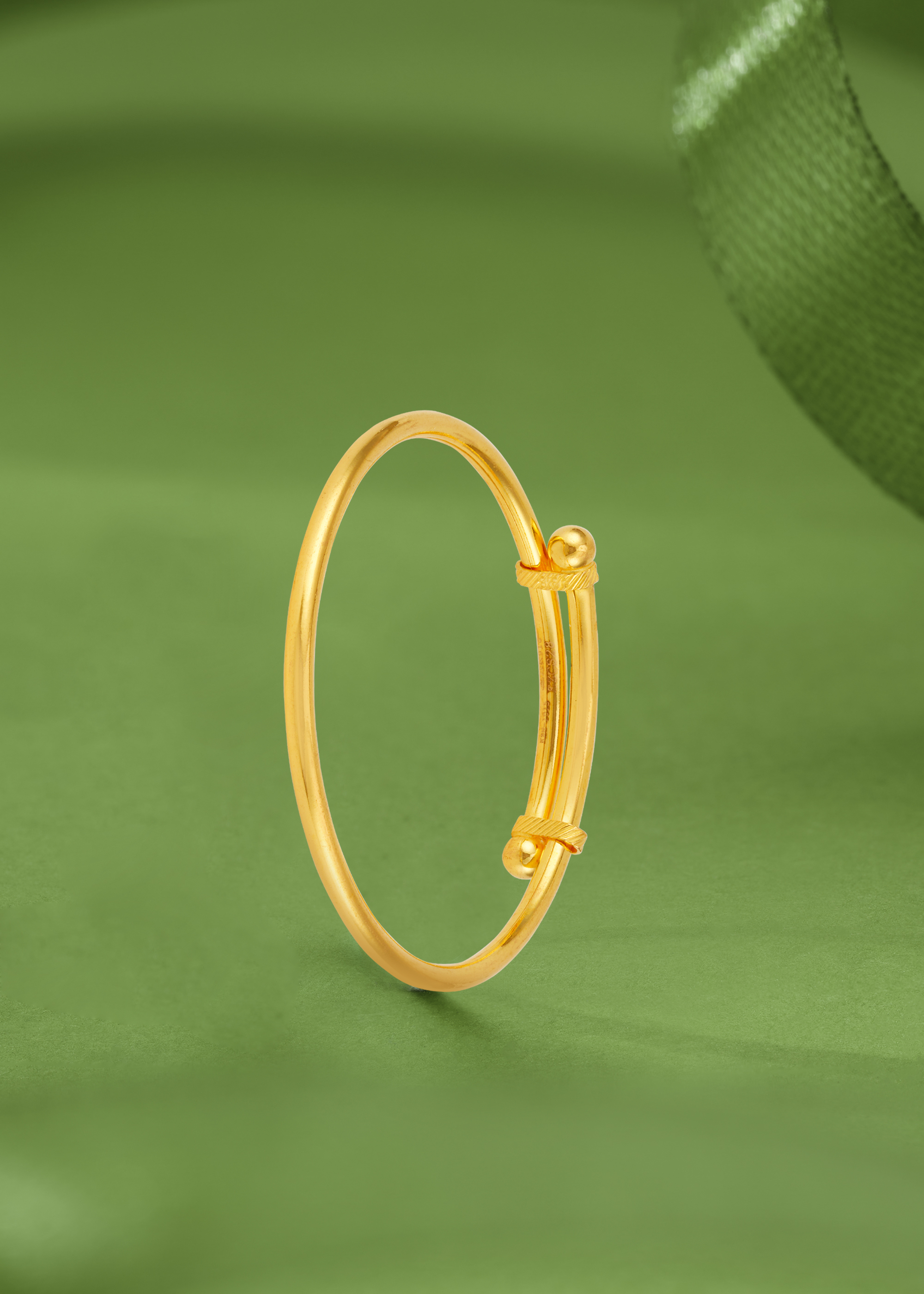 Tiny Twist 22K Gold Adjustable Bangle
